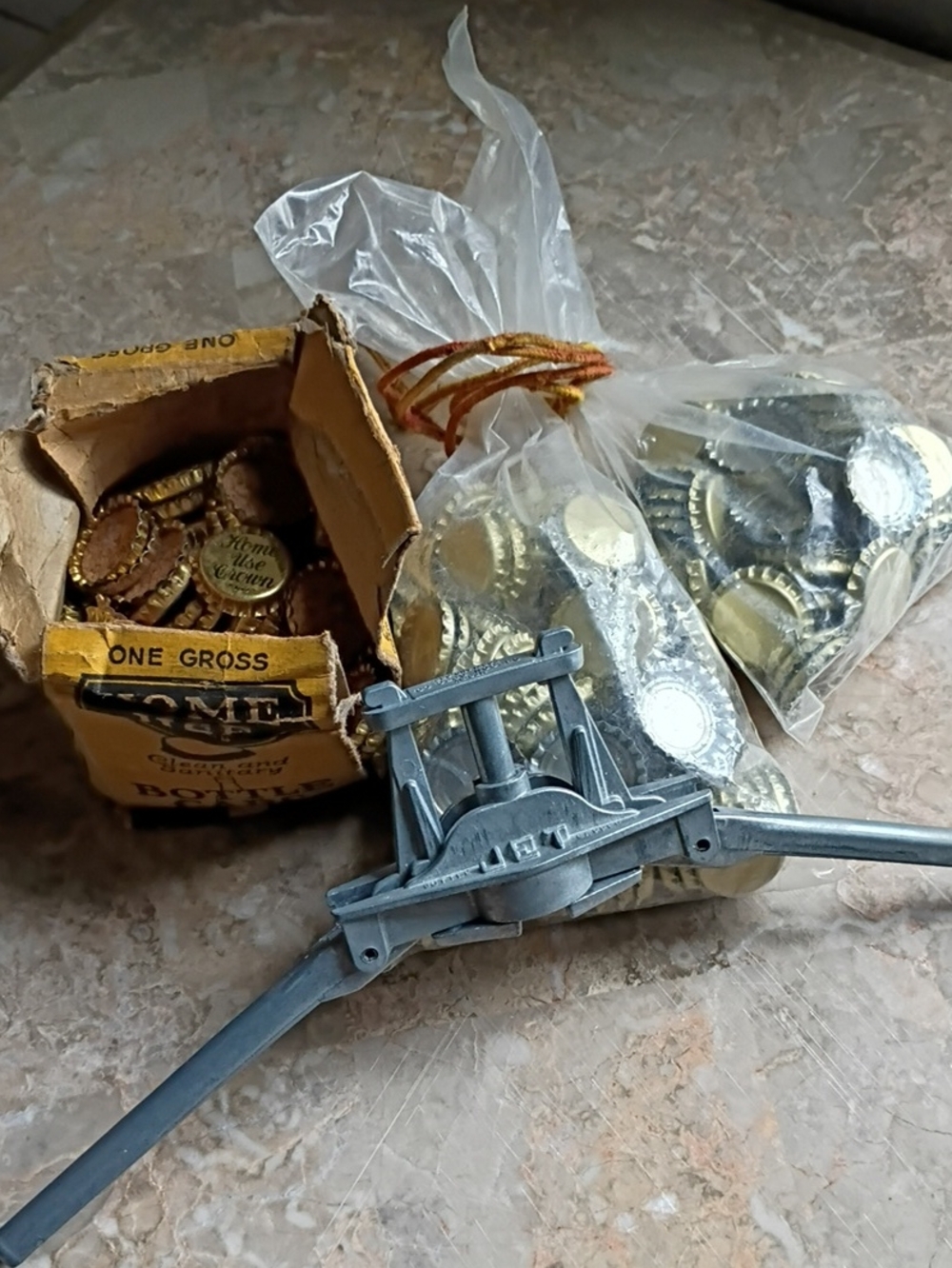 BOTTLE CAPS AND CAPPER